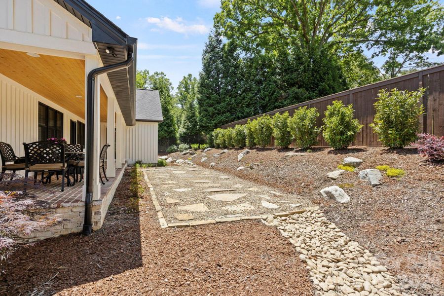 Exterior details and patio area of a home in , Hendersonville (Image 23).