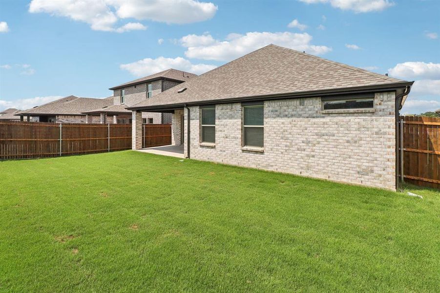 Exterior details and patio area of a home in Southridge - Signature Series, McKinney (Image 21). Exterior details and patio area of a home in Southridge - Signature Series, McKinney (Image 21).