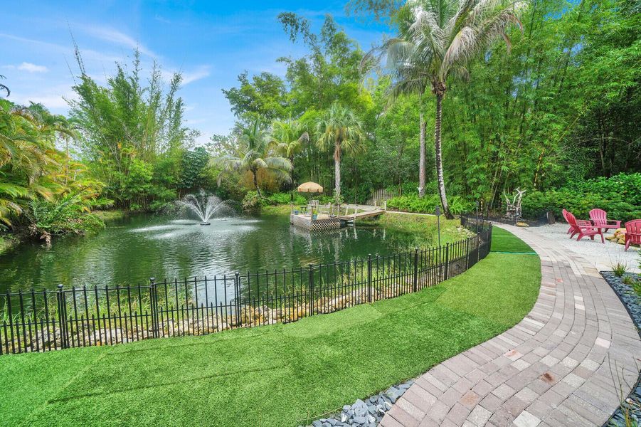 Paver walkway around pond to dock Paver walkway around pond to dock