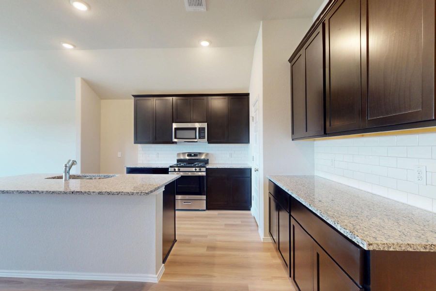 Furnished interior view inside a new home in Carillon, Manor (Image 7).