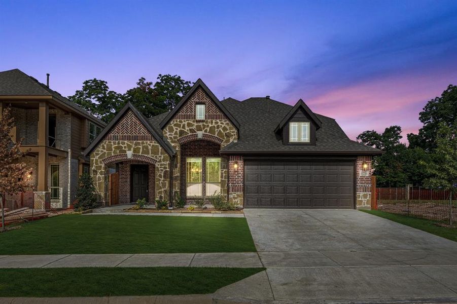 Front exterior of a new home in East Oak Creek 50-55, Commerce, TX, highlighting curb appeal (Image 24).