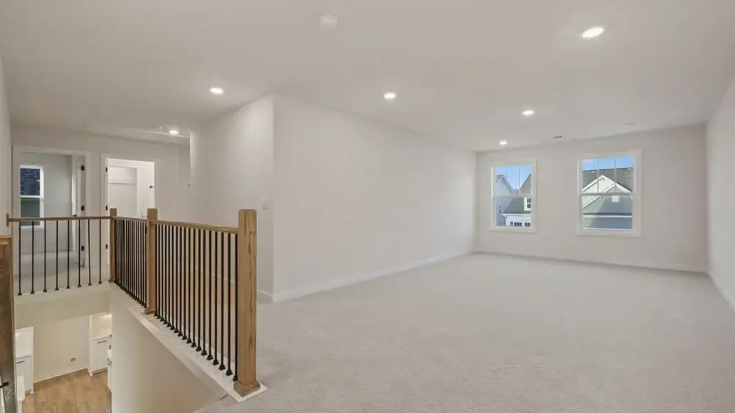 Representative unfurnished interior of a home built from the Summit by D.R. Horton in Spring Ridge Reserve, Anderson (Image 29). Representative unfurnished interior of a home built from the Summit by D.R. Horton in Spring Ridge Reserve, Anderson (Image 29).
