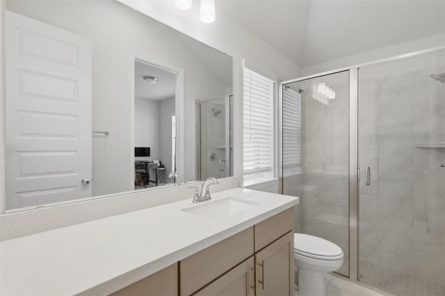 Convenient Jack-and-Jill bath connectssecondary bedrooms two and three. Convenient Jack-and-Jill bath connectssecondary bedrooms two and three.