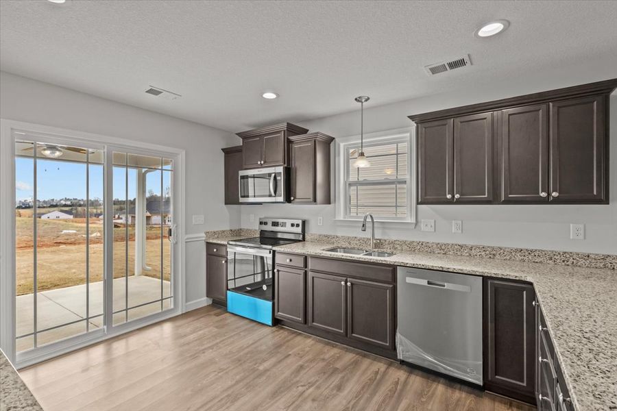 Representative furnished interior of a home built from the Ellison by Enchanted Homes in Hampshire Heights, Moore (Image 6).