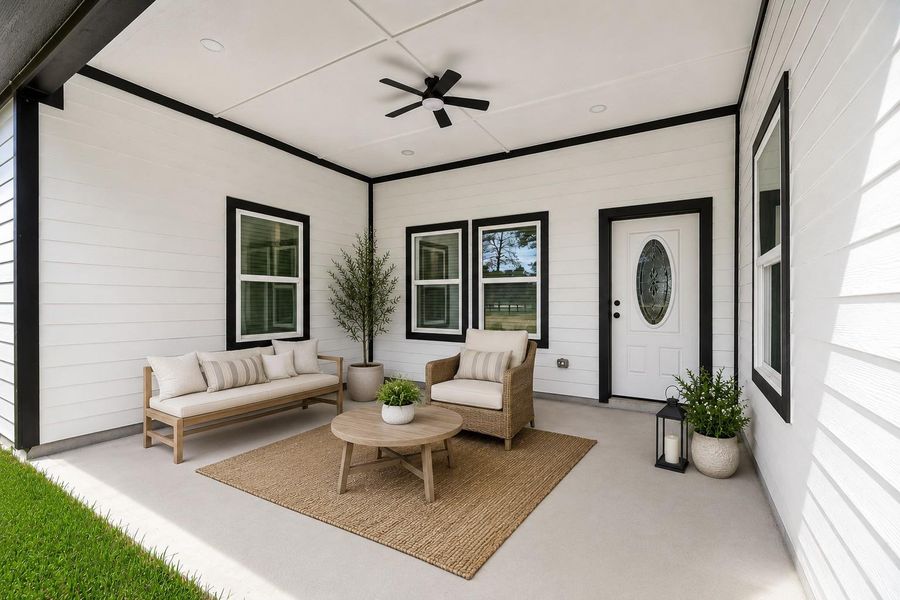 Spacious covered patio overlooking the expansive backyard. Virtually staged.
