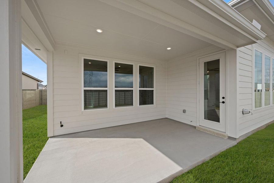 Exterior details and patio area of a home in The Retreat at Harvest, Argyle (Image 4).