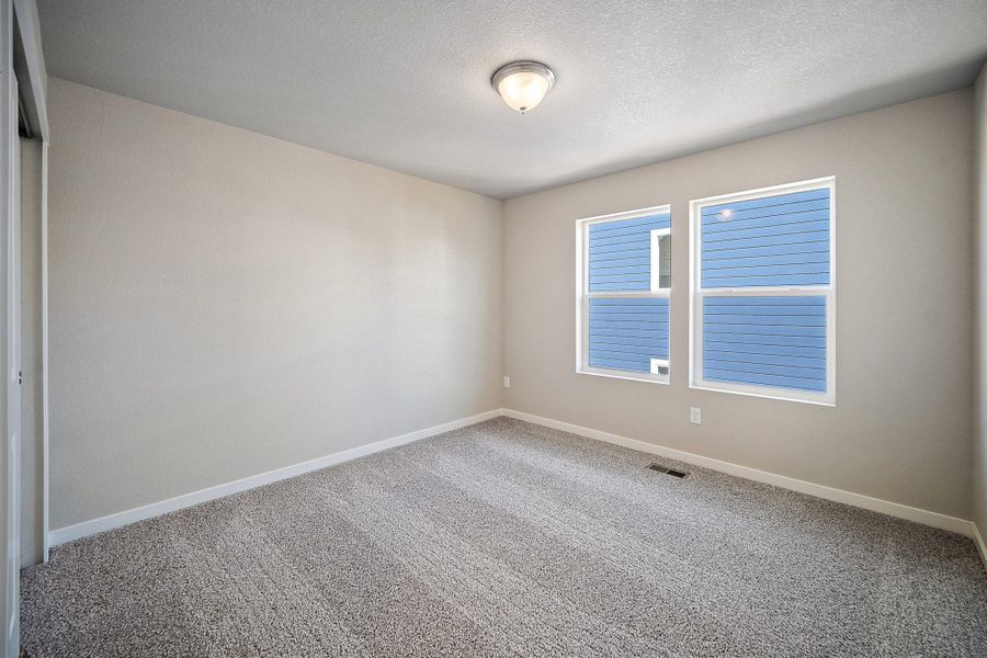 Spacious, unfurnished interior of a new home in Ridge at Lorson Ranch, Colorado Springs (Image 21).