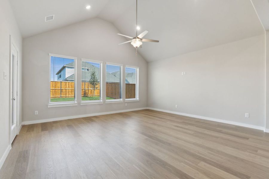 Living Room in the Claret home plan by Trophy Signature Homes – REPRESENTATIVE PHOTO