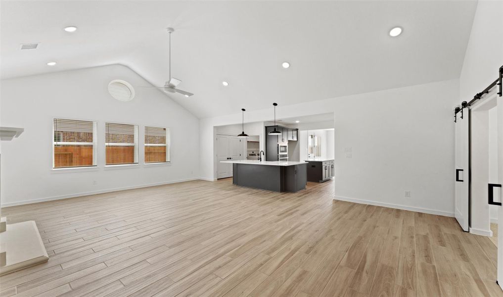 Open great room with vaulted ceilings (*Photo not of actual home and used for illustration purposes only.) Open great room with vaulted ceilings (*Photo not of actual home and used for illustration purposes only.)
