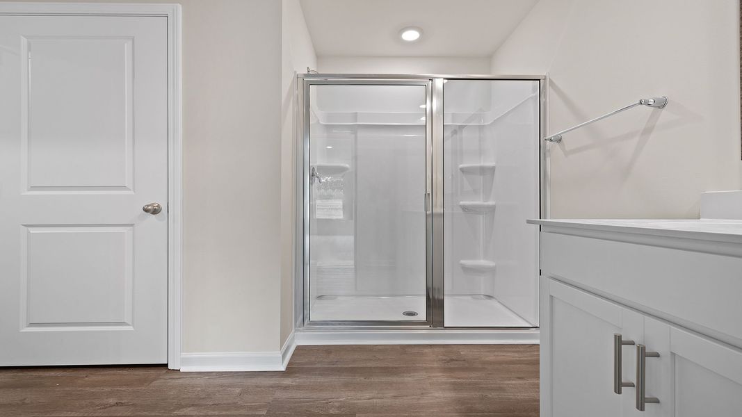 Spacious, unfurnished interior of a new home in Bentley Park, Greenwood (Image 26).