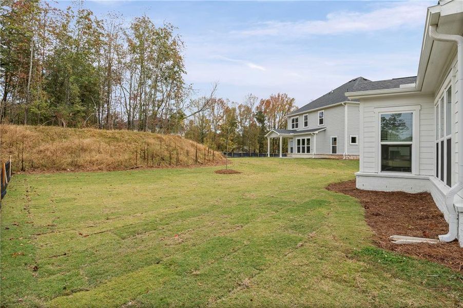 Exterior details and patio area of a home in Rose Creek, Cumming (Image 2). Exterior details and patio area of a home in Rose Creek, Cumming (Image 2).