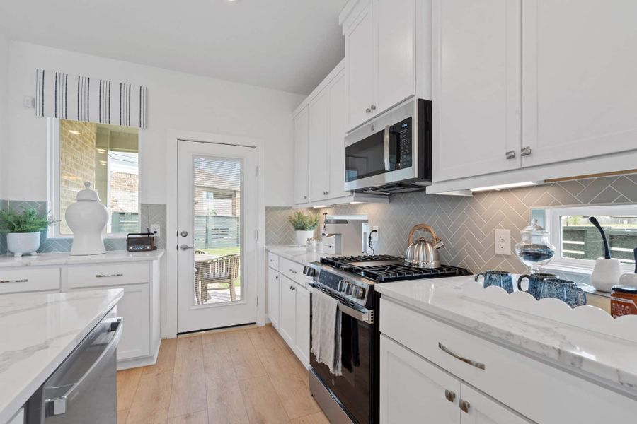 Furnished interior view inside a new home in Bridgeland, Cypress (Image 9). Furnished interior view inside a new home in Bridgeland, Cypress (Image 9).
