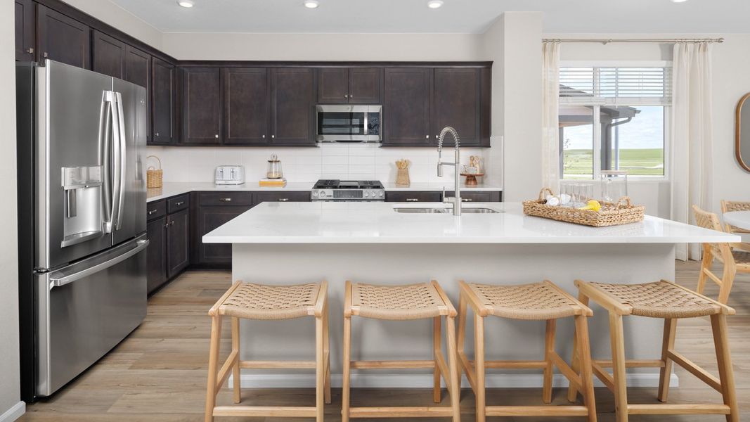 Furnished interior in a model home at The Casitas Collection at Windler in Aurora (Image 7).