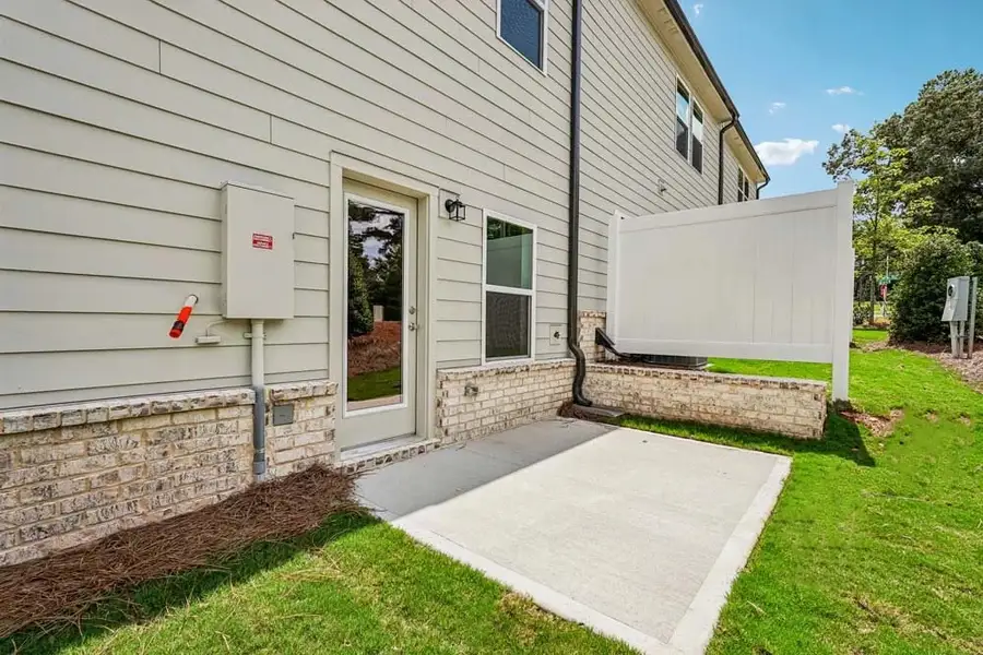 Rear Exterior with Private Patio