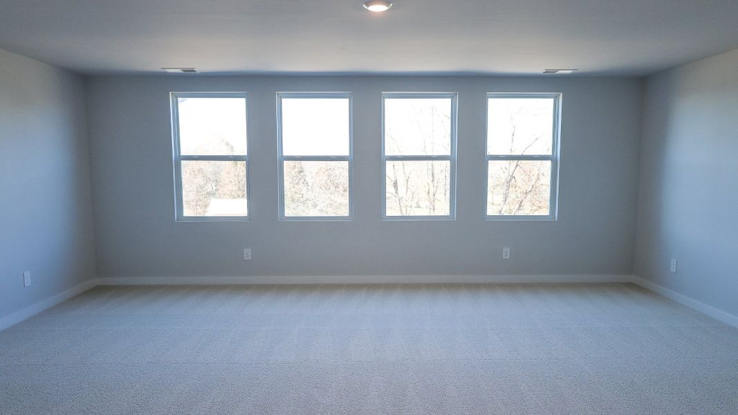 Representative unfurnished interior of a home built from the TISDALE by D.R. Horton in Harvest Point, Spring Hill (Image 54).