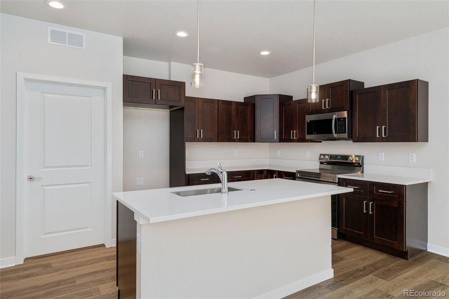 Furnished interior view inside a new home in The Courtyards at Lupton Village, Fort Lupton (Image 8).