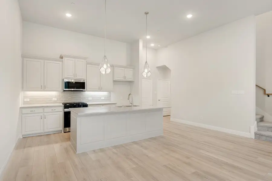 Furnished interior view inside a new home in Cottonwood Creek, Rowlett (Image 6).
