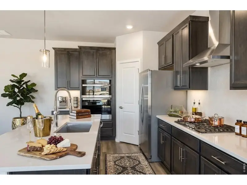 Furnished interior view inside a new home in Farmstead, Berthoud (Image 6).