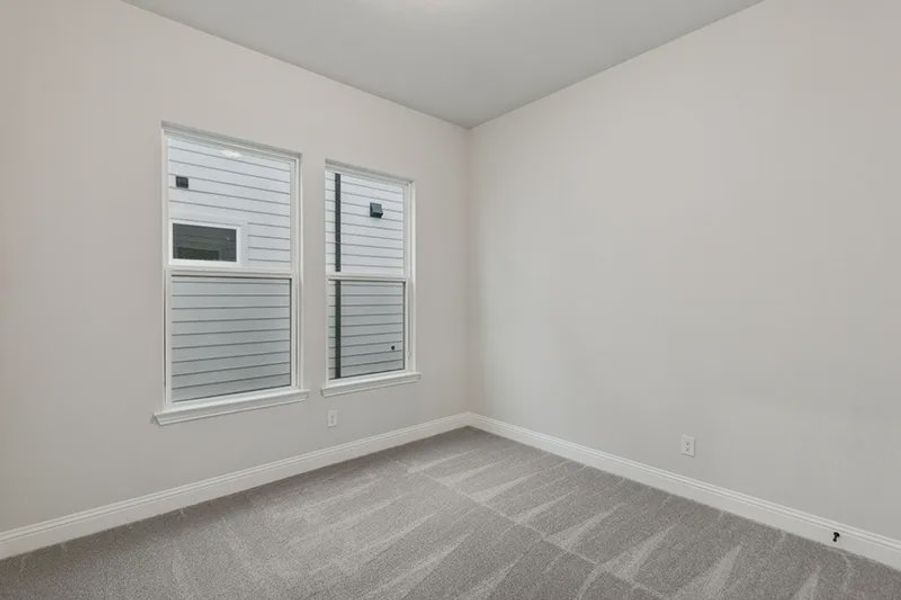Representative unfurnished interior of a home built from the Logan by Cambridge Homes in Lake Park, Rowlett (Image 18).