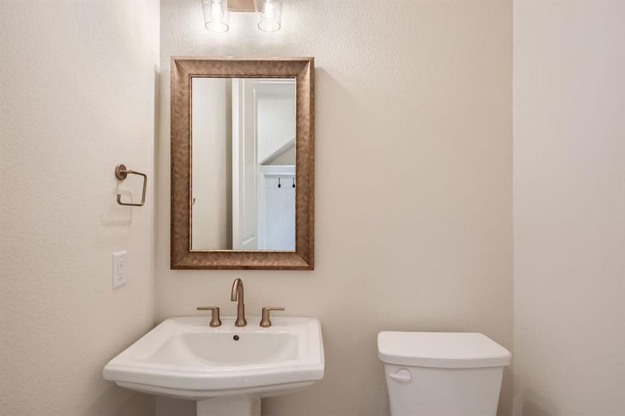 Bathroom with toilet and sink