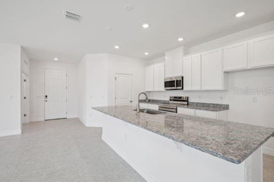 Furnished interior view inside a new home in , Punta Gorda (Image 9).