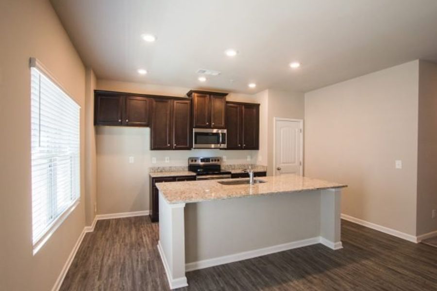 Representative furnished interior of a home built from the Cadence Unit B by Piedmont Residential in Ross Pointe, Kennesaw (Image 6).