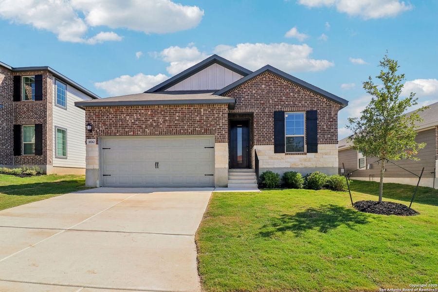 Front exterior of a new home in Royal Crest, San Antonio, TX, highlighting curb appeal (Image 1). Front exterior of a new home in Royal Crest, San Antonio, TX, highlighting curb appeal (Image 1).