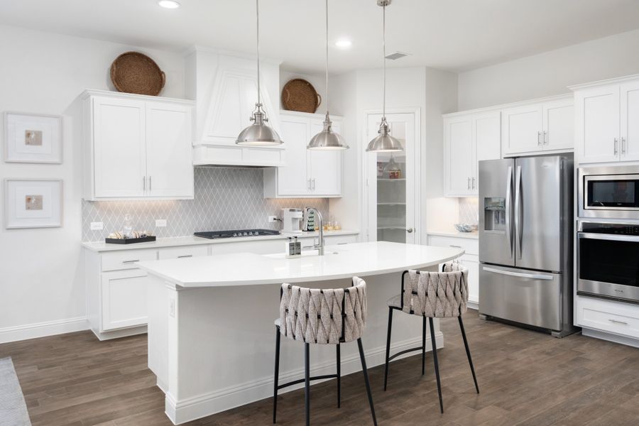 Representative furnished interior of a home built from the Kirby by UnionMain Homes in Lake Breeze, Lavon (Image 38).