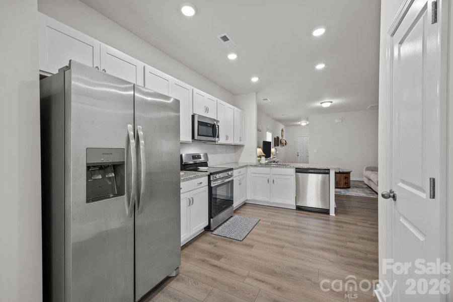 Furnished interior view inside a new home in Country Club Village, Salisbury (Image 5).