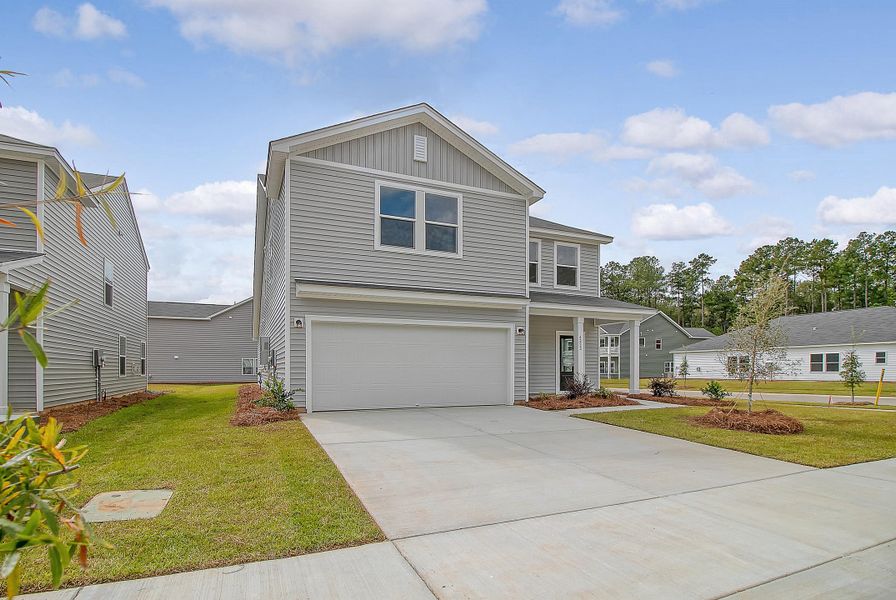 Front exterior of a new home in Watson Hill, Summerville, SC, highlighting curb appeal (Image 20).