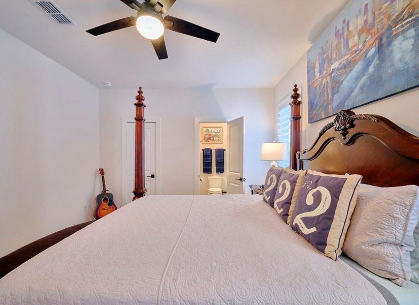 Three spacious upstairs bedrooms, each featuring an en-suite bathroom and walk-in closet.