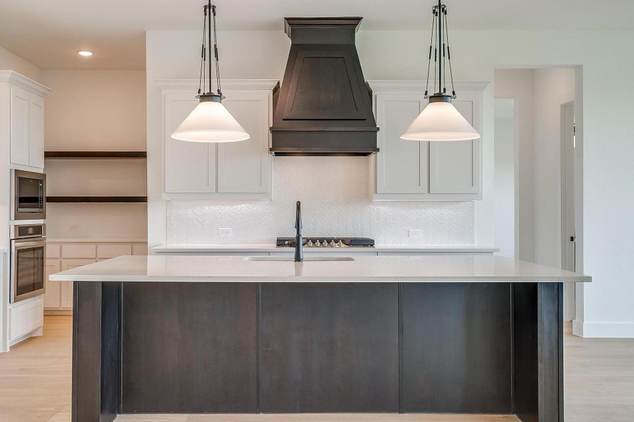 Representative furnished interior of a home built from the Livingston by Graham Hart Home Builder in Winding Creek, Keller (Image 5).
