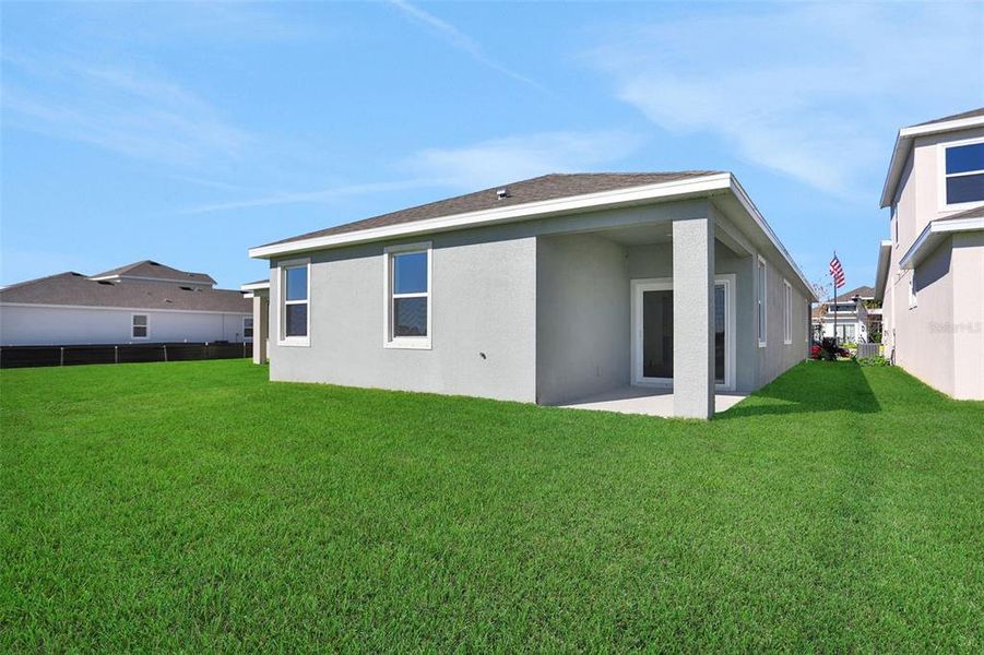 Exterior details and patio area of a home in Turnleaf, Punta Gorda (Image 22).