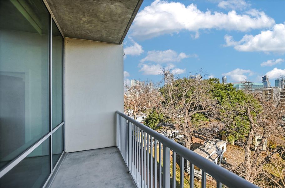 View from the 2nd BR Corner windows of UT, Downtown, Dog Run, Pecan Courtyard. Spectacular at Night as well. Mirror can be mounted near ceiling for a panoramic immersive view of the skyline and treetops.