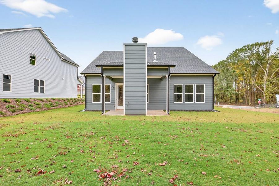 Exterior details and patio area of a home in Red Bird Manor, Jefferson (Image 27). Exterior details and patio area of a home in Red Bird Manor, Jefferson (Image 27).