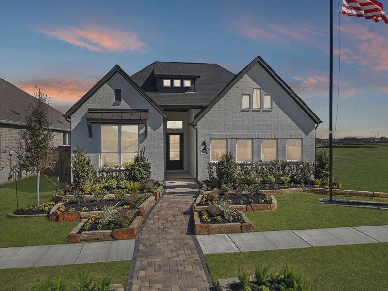Front exterior of a new home in Blue Heron, Mont Belvieu, TX, highlighting curb appeal (Image 28).