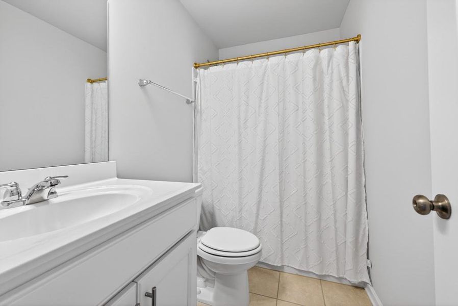 Furnished interior view inside a new home in Reunion, Flowery Branch (Image 53).