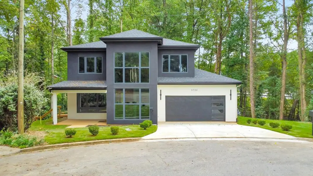 Front exterior of a new home in , Tucker, GA, highlighting curb appeal (Image 1).