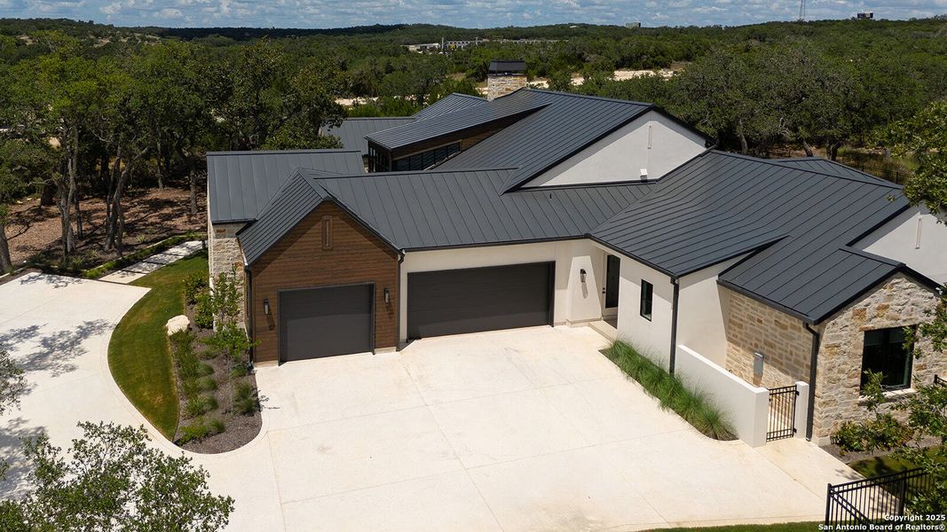 Front exterior of a new home in , Boerne, TX, highlighting curb appeal (Image 21).
