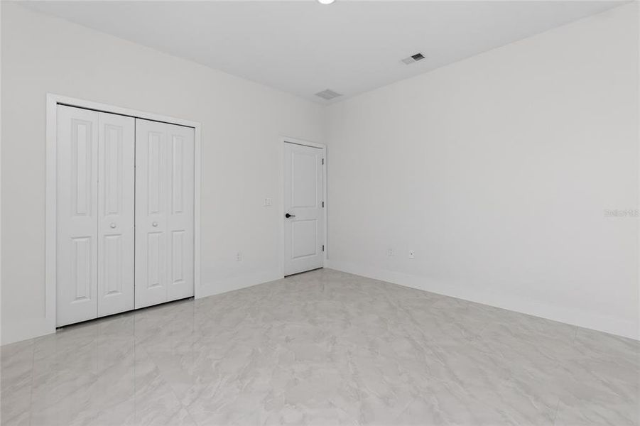 Spacious, unfurnished interior of a new home in , Port Charlotte (Image 22).