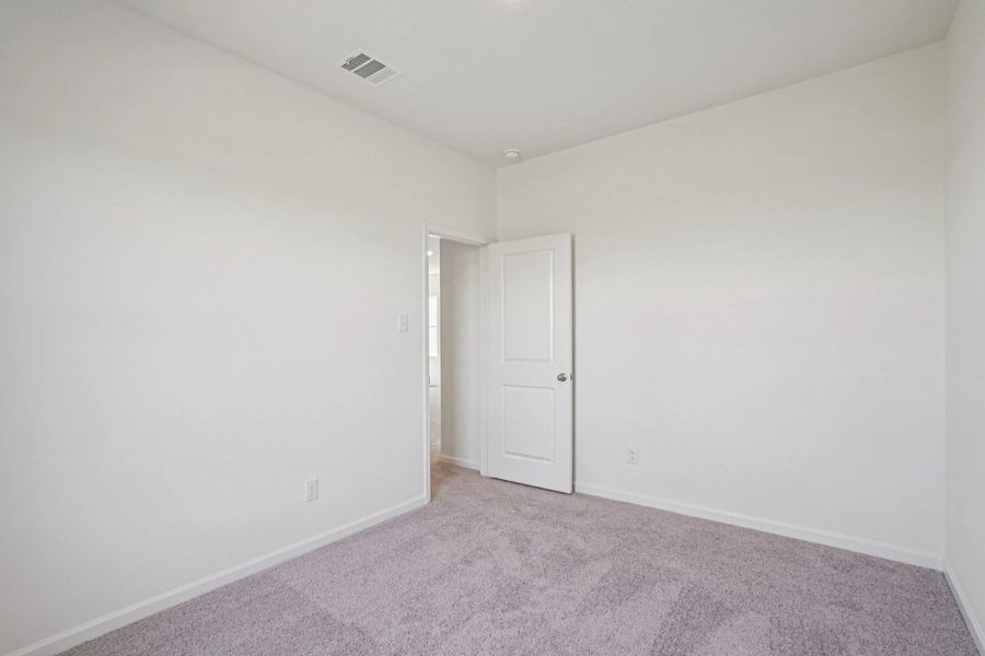 Representative unfurnished interior of a home built from the Odyssey by Starlight Homes in Oakfield Lakes, Parrish (Image 16).