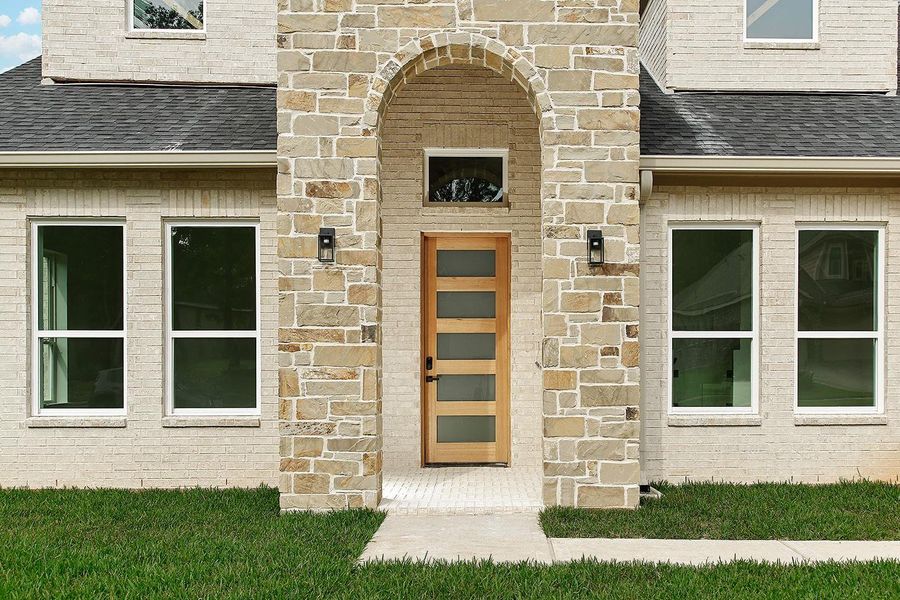 Exterior details and patio area of a home in , Conroe (Image 3).