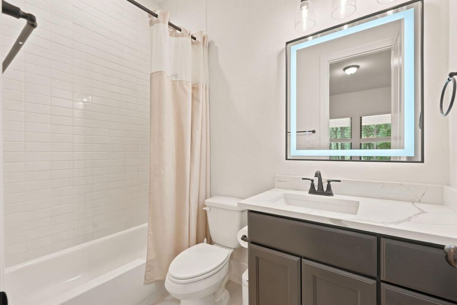 Furnished interior view inside a new home in , New Waverly (Image 19).
