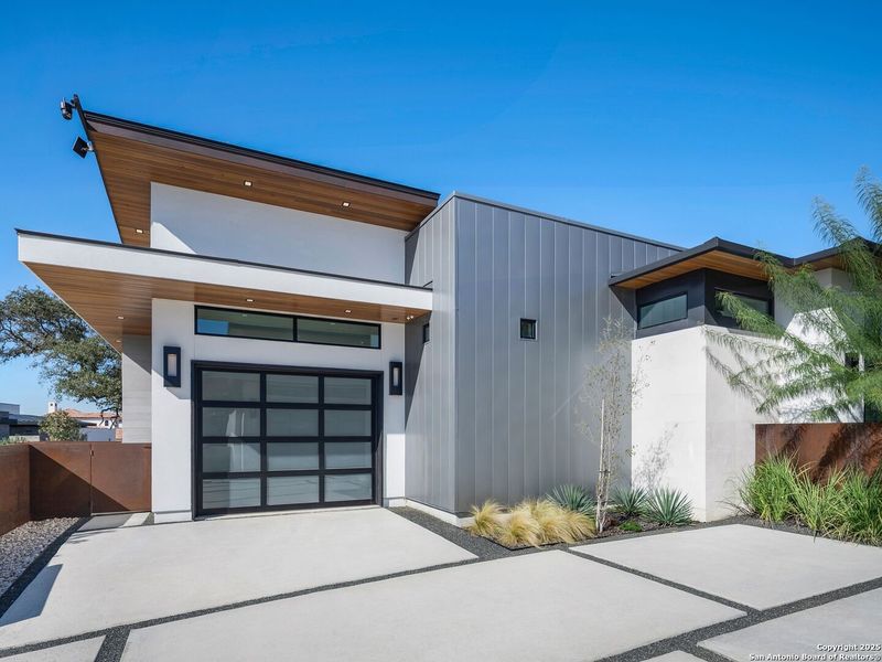Front exterior of a new home in , San Antonio, TX, highlighting curb appeal (Image 25).