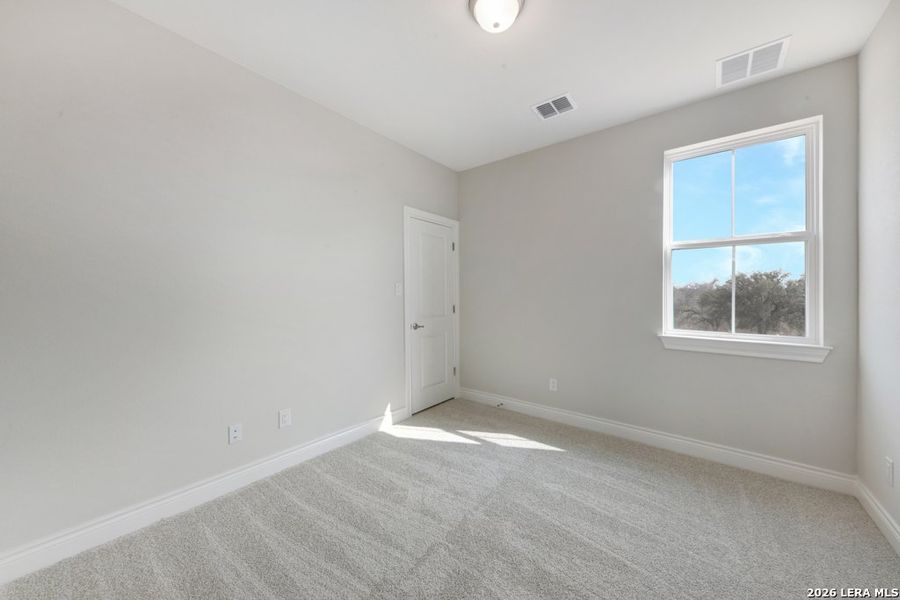 Spacious, unfurnished interior of a new home in Town Creek, New Braunfels (Image 17).
