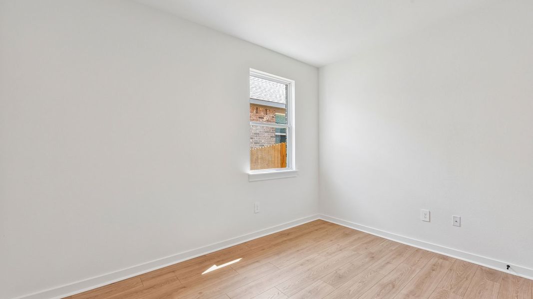 Spacious, unfurnished interior of a new home in Rosenbusch Ranch, Leander (Image 31).