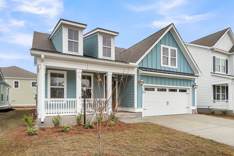 Front exterior of a new home in Kings River Preserve, Hollywood, SC, highlighting curb appeal (Image 2). Front exterior of a new home in Kings River Preserve, Hollywood, SC, highlighting curb appeal (Image 2).