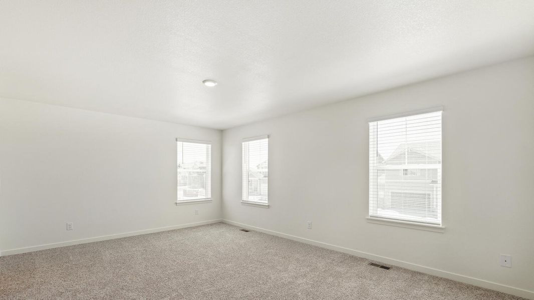 Spacious, unfurnished interior of a new home in Silver Peaks, Lochbuie (Image 21).