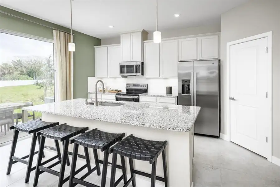 Representative furnished interior of a home built from the Mayshore by Ryan Homes in Pine Pointe at Astonia, Davenport (Image 4).