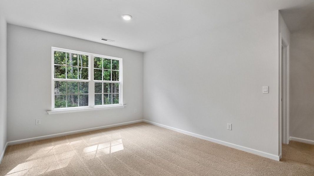 Spacious, unfurnished interior of a new home in The Landing at Summerhaven, Mebane (Image 25).